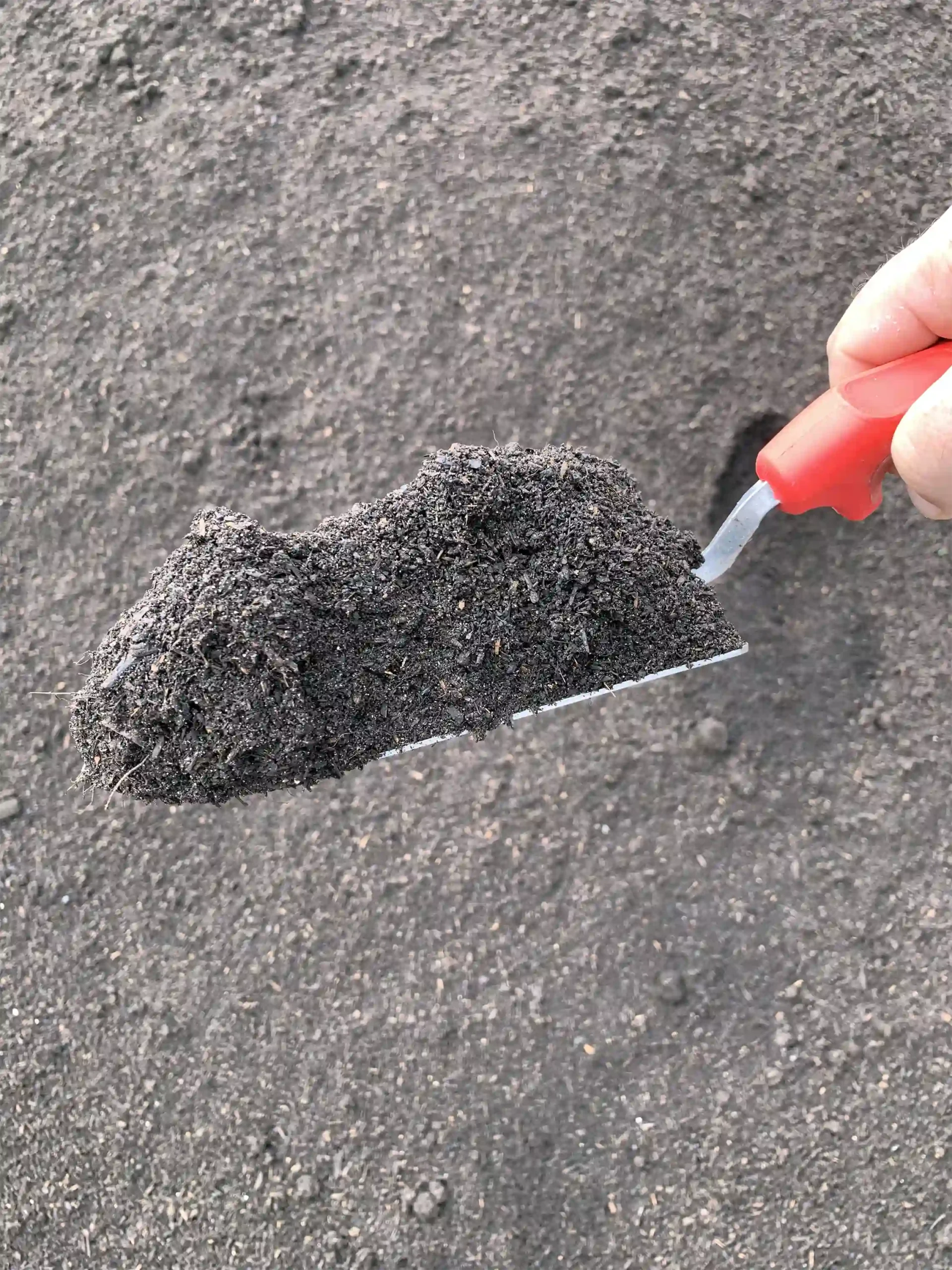 COMAND 3/8 inch Rootzone product is shown in a trowel.