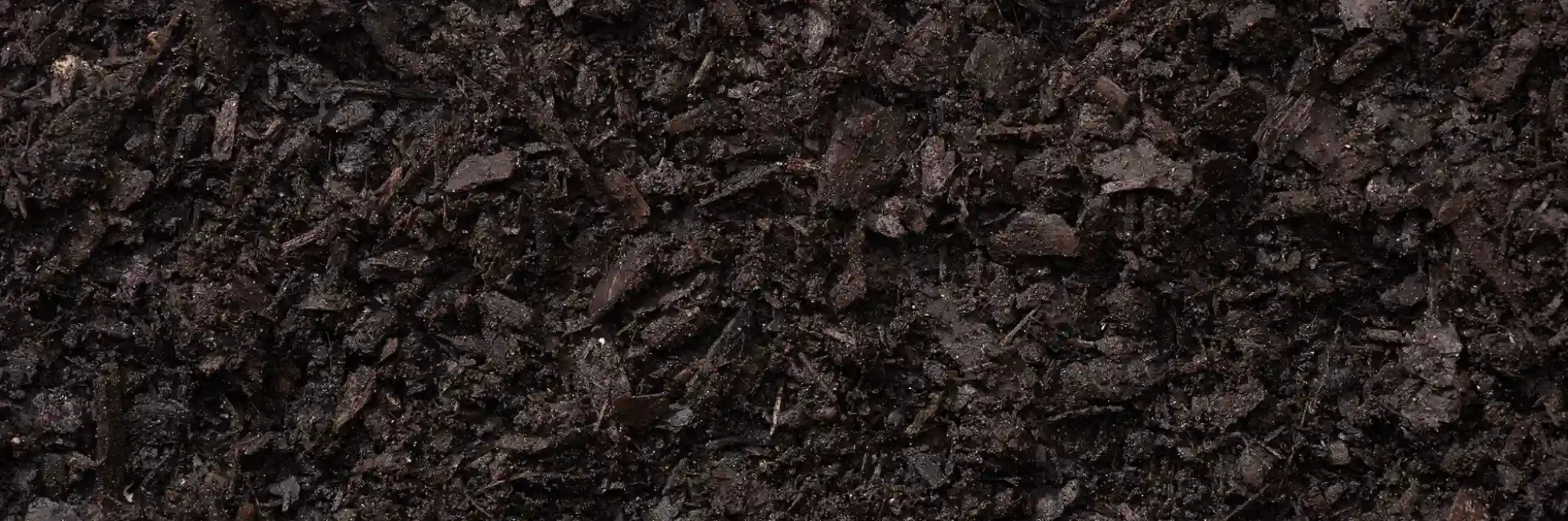 A close-up view of COMAND Scape Professional-Grade Planting Soil.