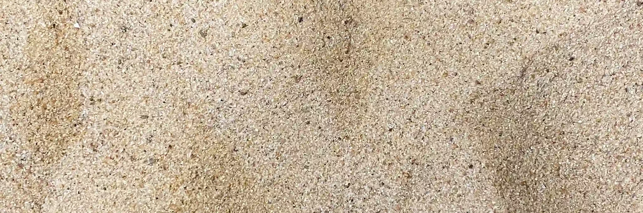 A close-up view of Fairway Sand, Capping Sand, and Golf Sand.
