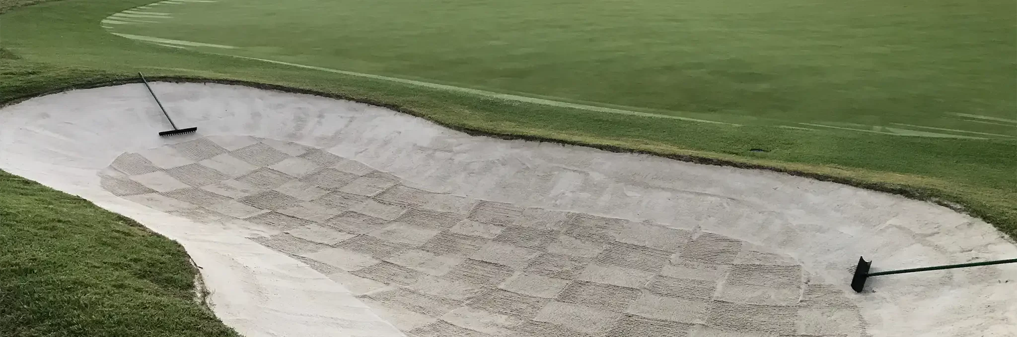 Premier play sand in use inside a golf course bunker.