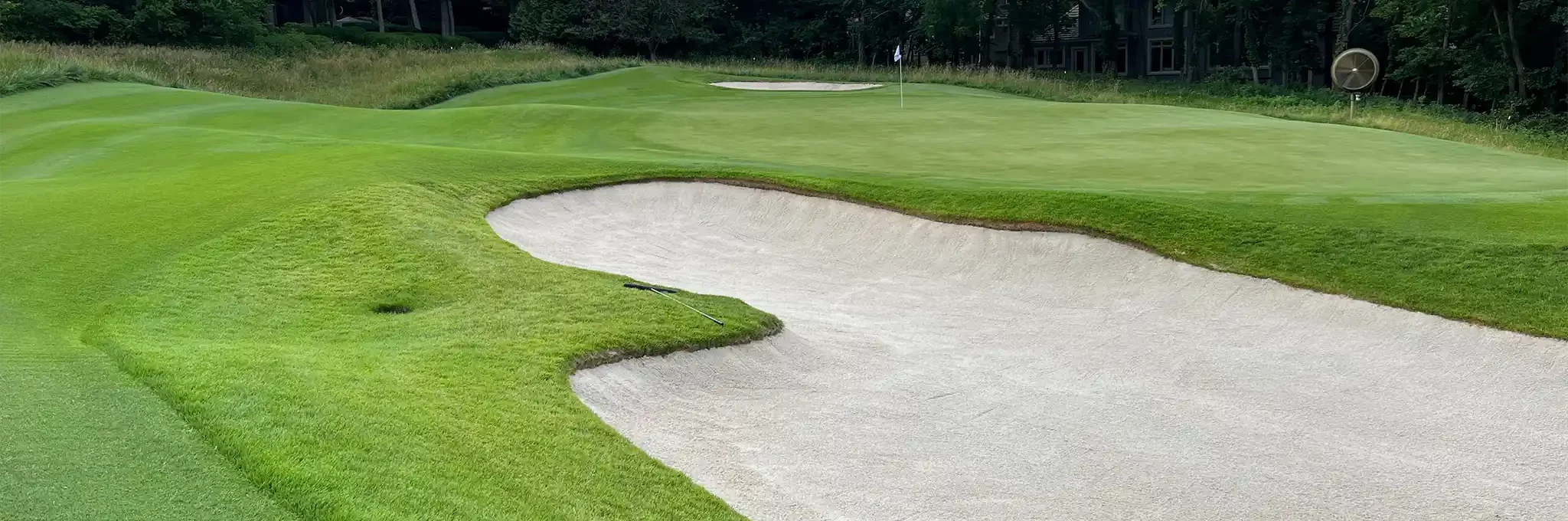 Premier play sand in use inside a golf course bunker.